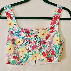 Matching crop top to awesome floral pants. Turn heads in this beautiful set.
